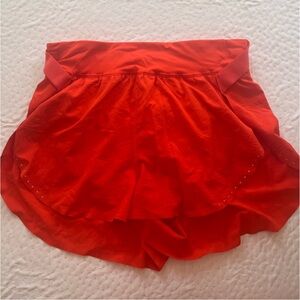 Lululemon Fast and Free running short in Solar Orange color